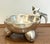 hammered silver over copper molcajete bowl made by Los Castillo in Taxco, Guerrero, Mexico, circa 1960's. Featuring a...