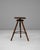 This 1920s French adjustable swivel stool with a tripod base exemplifies early 20th-century workshop functionality paired...