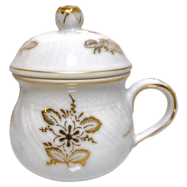 This is a stunning vintage Richard Ginori pot de crème set — six covered porcelain cups with lids and gold-tipped knops,...