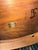 This elegant oval side table features a rich cherry wood finish with delicate inlaid floral patterns along the apron. It...