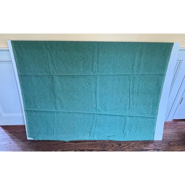 Over 5 yards of Brunschwig & Fils green fabric entitled “Sea Coral”.