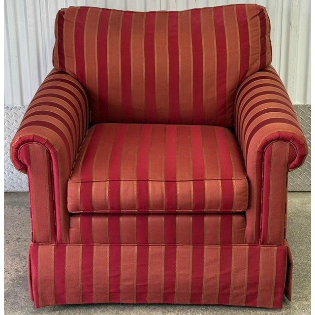 Classic pair of lounge chairs by Ethan Allen. Features skirted bottom, rolled arms, tight back cushion (attached) and...