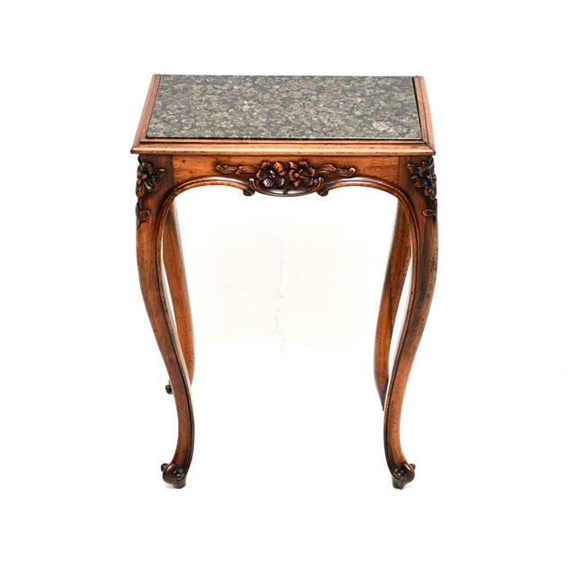A beautiful antique carved wood and marble side table. This was made in France, it dates from around the 1840-50’s period....
