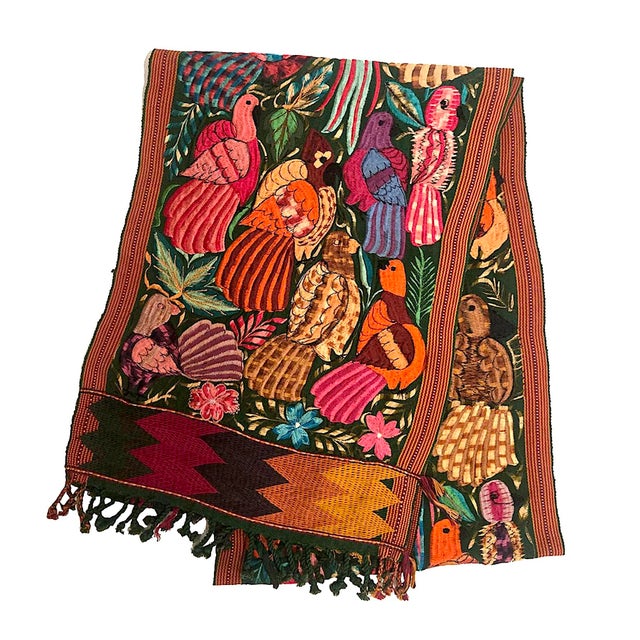 Offered is a hand-embroidered vintage Mexican wall hanging or table runner with densely saturated bird motif. There is...