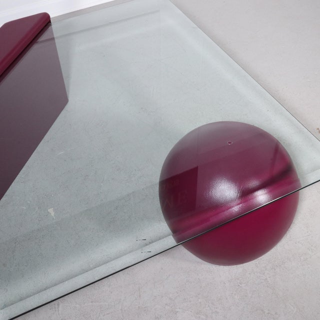 1980’s post modern coffee table featuring painted shapes and that support a beveled glass top. Nice vintage condition...