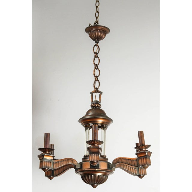 Excellent Quality Bronze and glass neoclassical chandelier newly rewired for six standard bulbs. New brass candle covers.