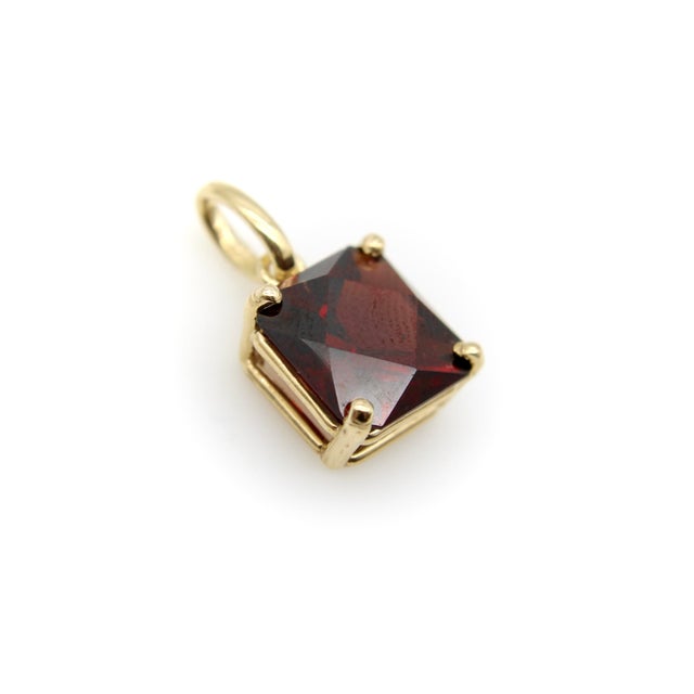 This beautiful fancy cut square Tanzanian garnet was sourced in Tanzania. It has a unique cut, square in shape with criss-...