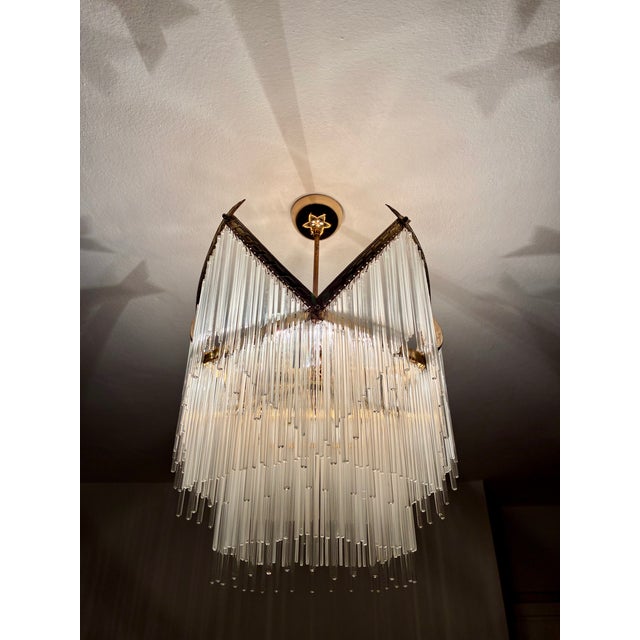 are 1960s Vintage Glass Rod Chandelier – Aged Brass & Curved Frame – Provenance: Historic Greek Mansion in Cappadocia –...