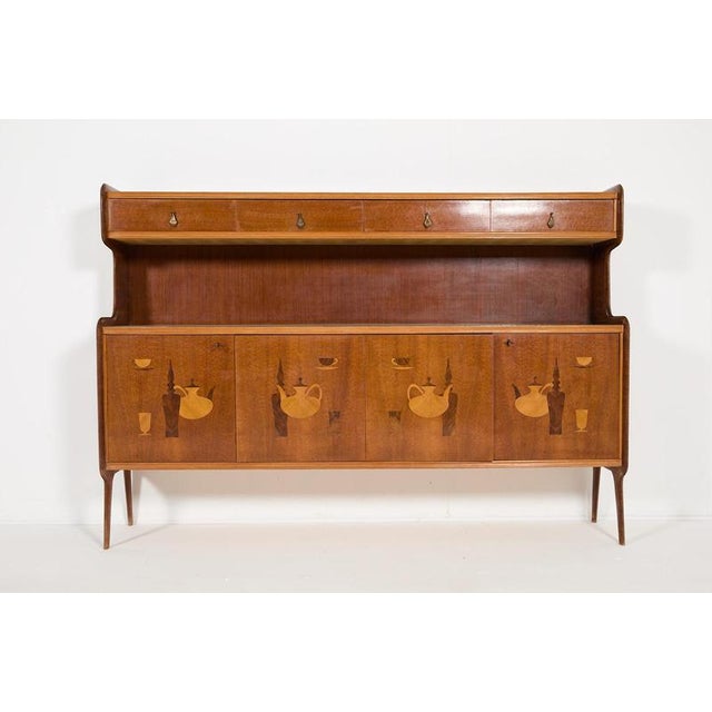 Beautiful exceptional Italian craftsmanship serving cabinet/bar in spectacular veneer finish. Equipped with 4 drawers and...