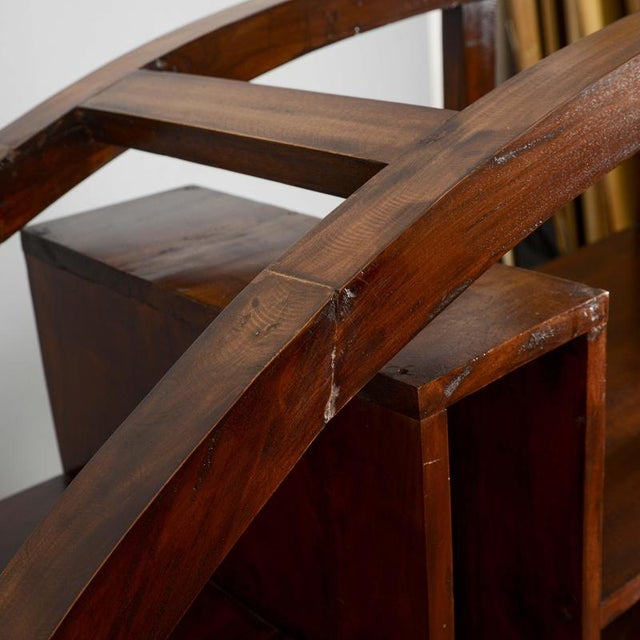 This extraordinary vintage oriental-style bookcase, characterized by a circular or "moon" shape, is a visually striking...