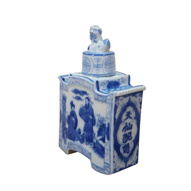 Vintage Chinese export blue and white porcelain tea caddy decanter featuring hand-painted Foo Dog lid and landscape scenes...