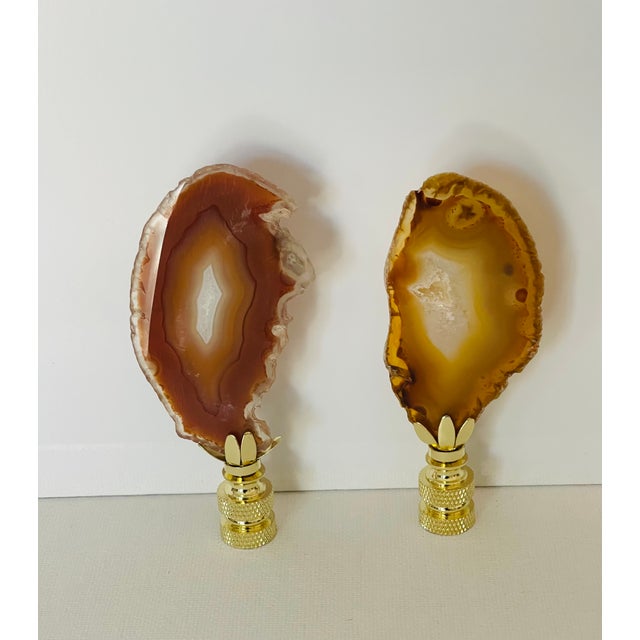 Beautiful natural color agate stone slices mounted on brass bases as lamp finials.