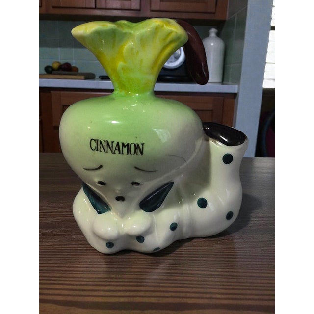 This vintage anthropomorphic made in Japan spice jar is a unique and whimsical addition to any kitchen or collection....