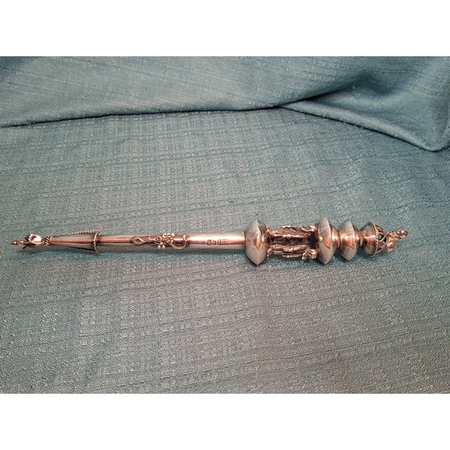 This exquisite antique Torah pointer, known as a Yad (Hebrew for "hand"), is a fine example of 19th-century Russian...