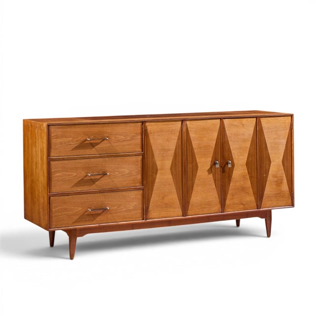 Ramseur Harlequin Mid Century Walnut Credenza and Hutch The credenza measures: 69 wide x 19 deep x 33 inches high The...