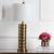 Momentous occasion. The traditional table lamp gets a modern makeover with the brass column table lamp (set of two). it's...