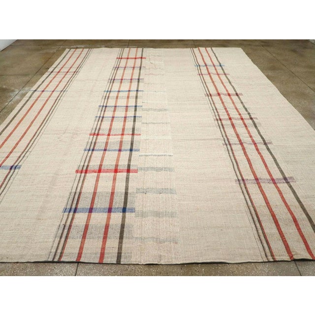 A vintage Turkish flatweave Kilim large room size carpet handmade during the Mid-20th Century. Measures: 11' 11" x 15' 0".