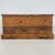 A characterful 20th-century English storage chest, well crafted from pine and distinguished by its generous storage...