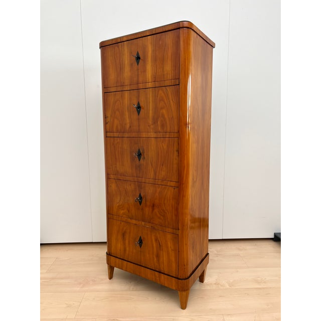 Beautiful unadorned Biedermeier Chiffonier with 5 drawers in cherry veneer from South Germany around 1820. Gorgeous,...