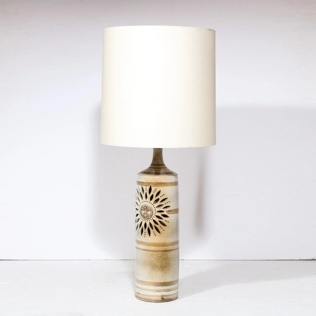 This refined Mid Century Modern ceramic handpainted table lamp was realized by the legendary Georges Pelletier in France...