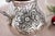 Silver Pot with Raised Floral Motifs Surrounding Monogram Card and Question Mark Handle, in Good conditions. Designed 1920...