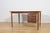 This desk was designed by Danish designer Rosengren Hansen in the 1950s. It features an interesting walnut wood grain and...