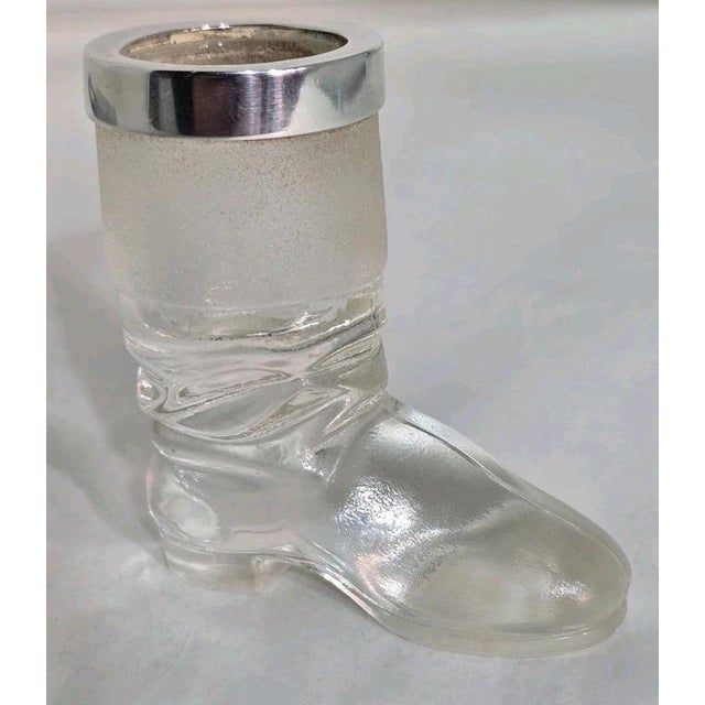 A distinctive George V novelty match striker dating to 1911, charmingly fashioned in the form of a traditional boot. The...