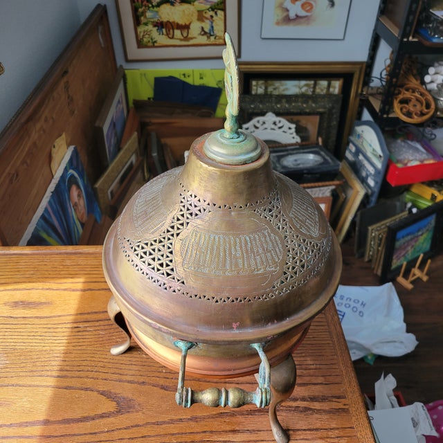 The Antique Arabic Turkish Brass Brazier is a unique and stylish piece that features a pierced brass dome with a crescent...