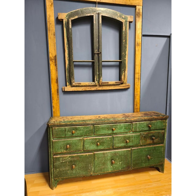 This old, worn-out piece of furniture was made in Hungary at the end of the 19th century. According to stories, it was in...