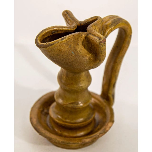 Antique Islamic Persian Nishapur Style Ceramic Glazed Oil Lamp. A stunning brown pottery oil lamp in the unique Nishapur...