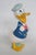 This adorable Donald Duck Figurine is made out of earthenware clay ceramics. This lovely little piece was made by Dan...