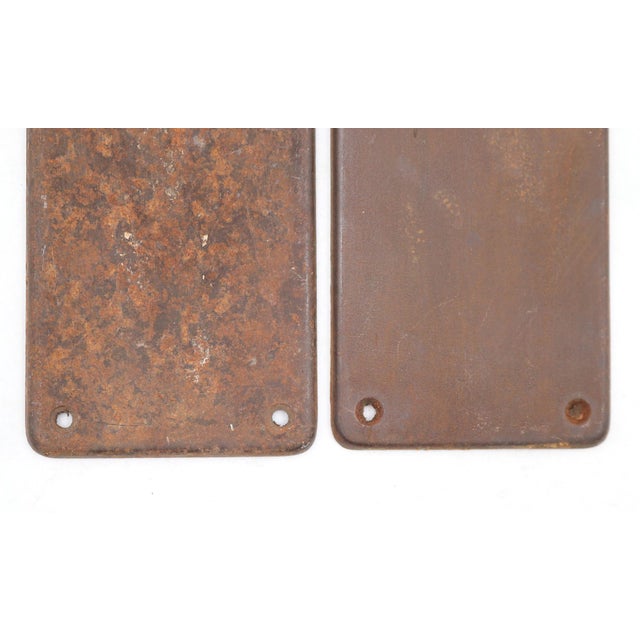 Reclaimed push plates made of steel with an antique bronze and rusted finish. The original mounting screws are not...