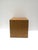 A beautiful wood veneered pedestal cube end table, in the Modern design style or Midcentury Modern design period, circa...