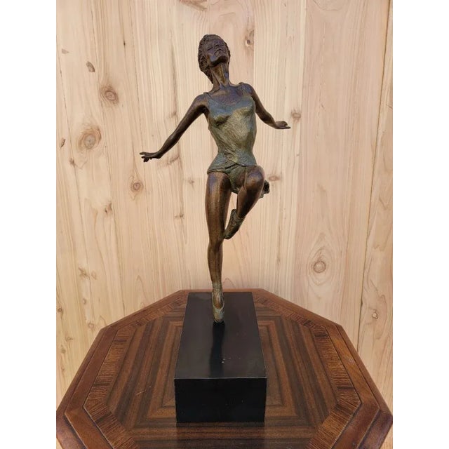 Vintage Bronze Ballerina Sculpture by Peggy Mach Beautiful, en pointe ballerina bronze sculpture on rectangle base. Signed...