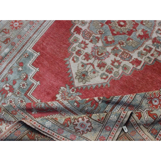 Mid 20th Century Vintage Turkish Oushak Rug With Medallion Design in Coral Pink and Light Blue For Sale - Image 9 of 11