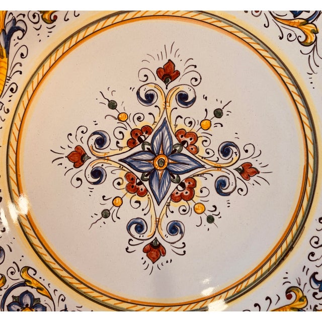 An impressive 14-inch Italian majolica charger from Deruta, celebrated for its centuries-old tradition of decorative...