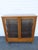 This brilliant Cabinet is made of wood, solid wood, oak, tiger oak, glass, and metal. It was made by Peck & Hills...