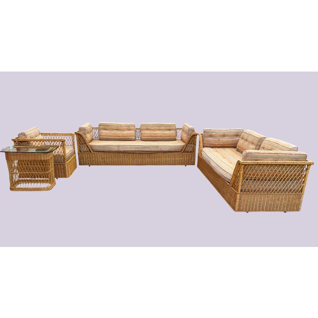 The iconic "Willow" Collection designed by David Allen for McGuire Furniture, circa 1970s. This substantial five-piece...