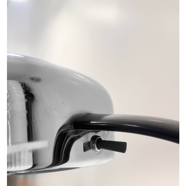 Ateljé lyktan ab (sweden) model 8012 chrome arc table lamp with matte black arm, circa 1970 a refined example of...