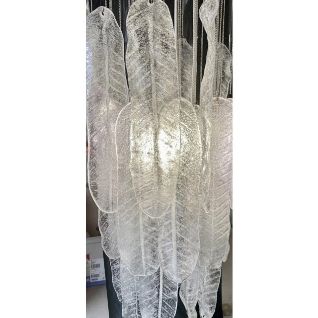 Exceptional cascade pendant with leaves glass Murano oversized around 30 cm with CHROME structure. The Design and the...