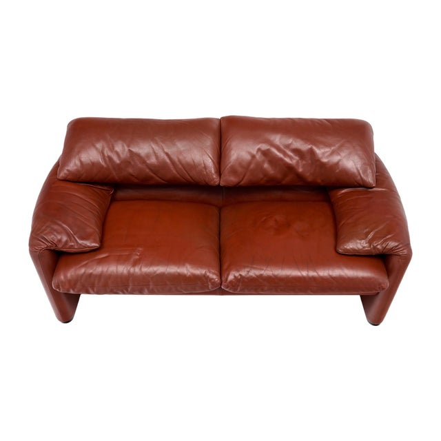 Love seat sofa from Italy made with the original red Italian tan leather. This piece was designed as part of the Maralunga...
