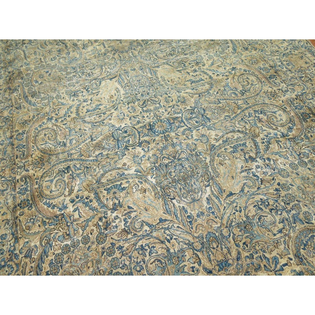 An early 20th century all over Formal design Persian oversize long carpet in pretty green, blues and khaki tones Measures:...