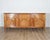A handsome 19th-century French enfilade crafted from richly grained cherry wood, combining generous storage with refined...