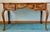 Three drawer writing desk crafted in solid maple and birch by Ethan Allen from their Country French Collection. Nicely...