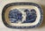 Set of 5 vintage blue and white transferware oval dinner plates in the "Old England Cambridge Blue" pattern featuring a...