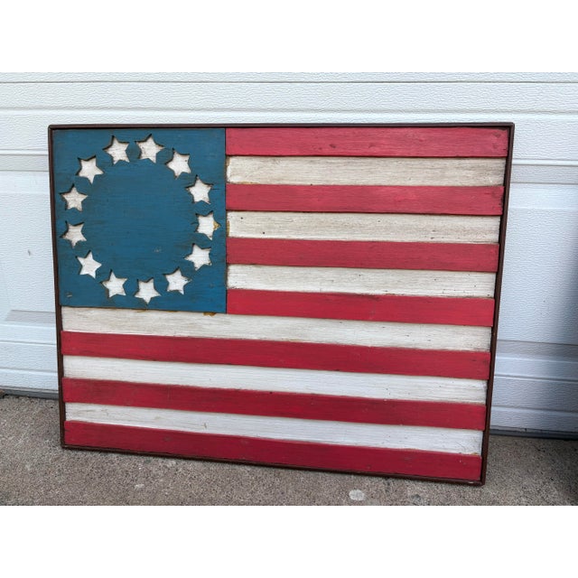 A vintage Americana wooded American flag. Besty Ross American flag. Beautiful wall hanging. Ready to hang! Made of wood.