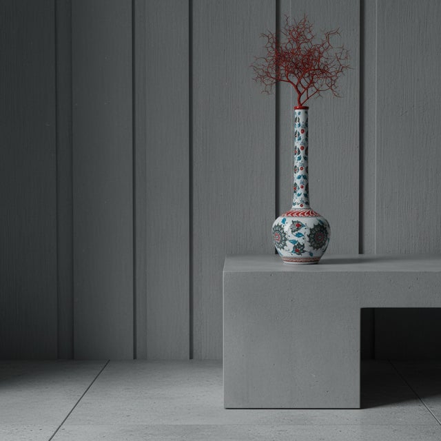 The Height of Sophistication This Handmade Ceramic Vase is a study in contrast and form. Standing at 25 cm, its Long Neck...