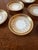Gold rimmed with a Greek Key band, these handsome little Limoges dishes are smaller than a butter plate, yet deep enough...