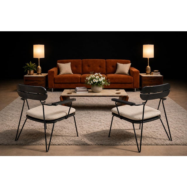 Designed by Carlo Hauner in the 1950s, this pair of armchairs reflects the refined structural clarity that defined...