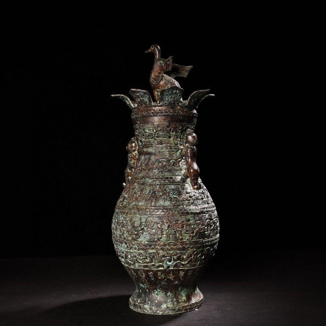 This is a striking vintage Chinese bronze vessel, crafted in the archaic style of ancient Shang and Zhou dynasty ritual...